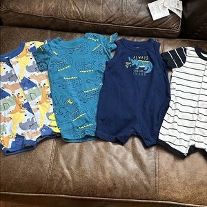 Set of Baby Rompers with Animal and Striped Designs size 6 month.